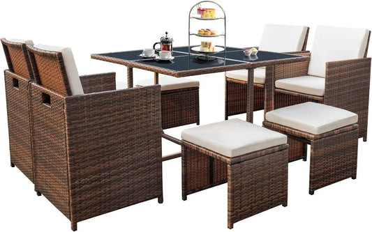 9-Piece Outdoor Rattan Patio Dining Set with Space-Saving Chairs, Glass Table & Cushions